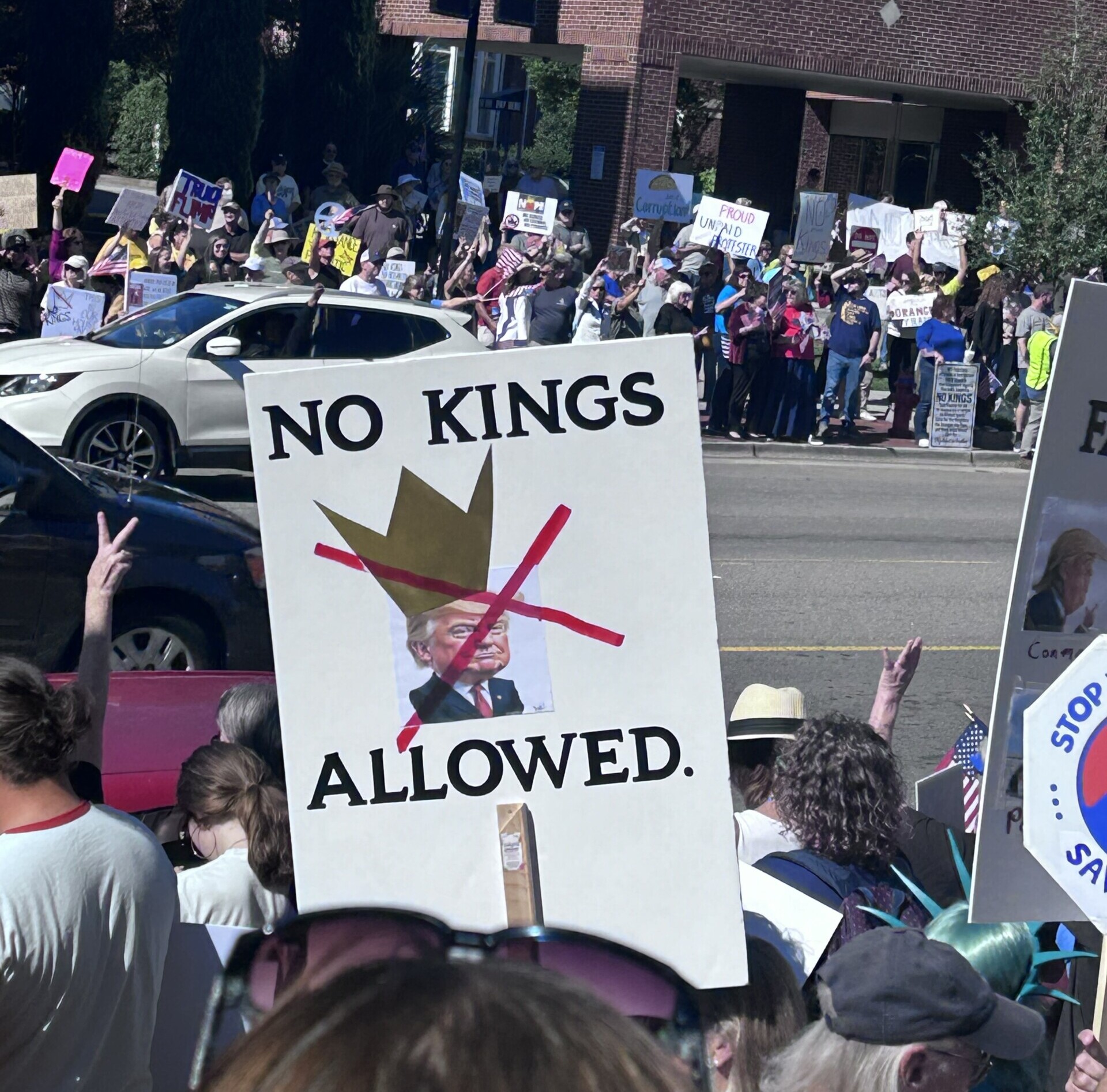 Hundreds gather in downtown Wilmington for ‘No Kings’ protest